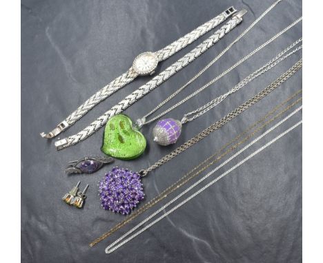 A small selection of silver and white metal jewellery including an Excaliber silver wrist watch with matching bracelet, brooc