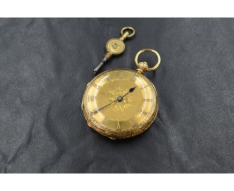 An 18ct gold open face pocket watch, the golden dial having floral decoration and Roman numerals with decorative scroll work 