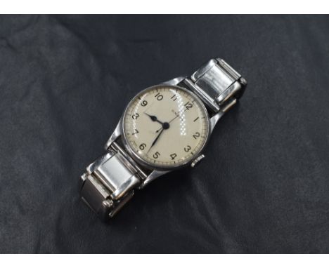 An Omega military wristwatch, the cream signed oyster dial having Arabic numerals and the reverse marked '(arrow) 6B/159 A218
