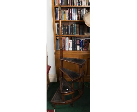 A reproduction set of four-step revolved library steps, with brass finial mount, on castors, 168cm high 