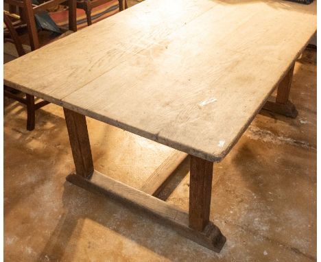 An oak large kitchen table, Arts and Crafts period, circa 1900, the attractively water washed pale rectangular top on three p