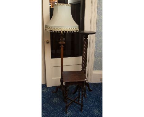 A Victorian gothick style gong with beater, an oak barley twist leg occasional table: a standard lamp, and a mahogany “bed po