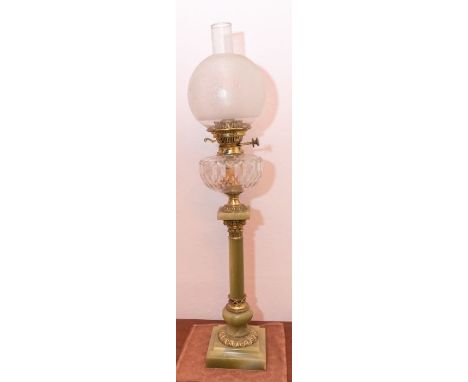 A late Victorian brass and champleve enamel mounted alabaster table oil lamp circa 1900, with later floral etched shade, 87cm