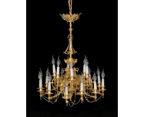 ‡A French gilt metal eighteen light chandelier, circa 1875 and later fitted for electricity, with a tier of six sconces above