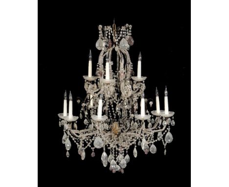 A wrought iron and cut glass adorned twelve light chandelier in Louis XV style, 20th century, the framework dressed and hung 