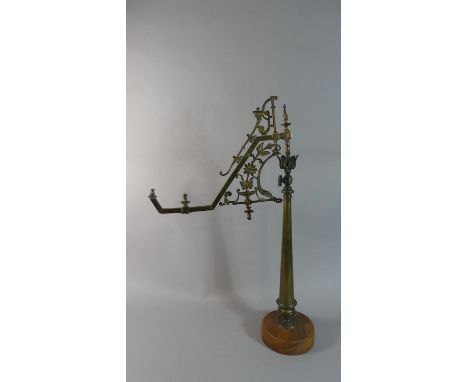 A Late 19th Century Brass Lamp Crane on Late Circular Wooden Plinth, 71cm High 