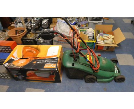 An Electric Qualcast Electric Mower and a Flymo Hover Compact 300 Mower 