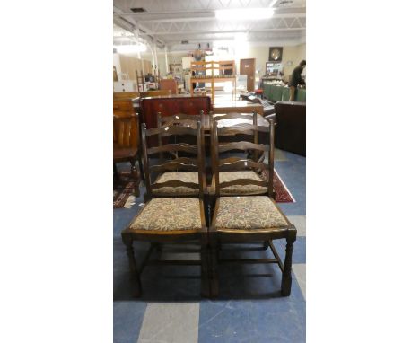 A Set of Four Mid 20th Century Oak Ladder Back Chairs 