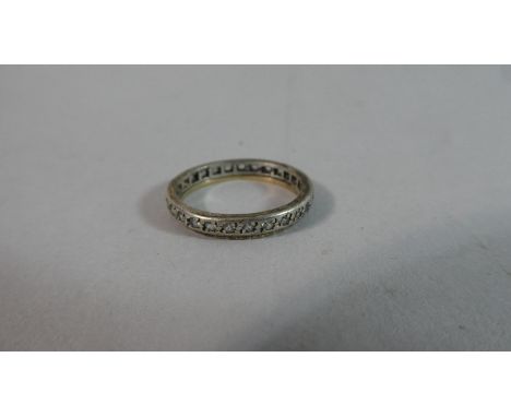 A Vintage White Metal and White Stone Full Eternity Ring 
