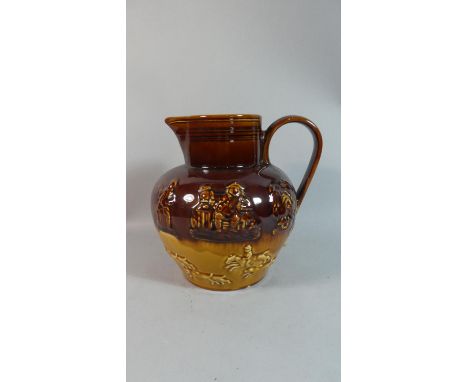 A Treacle Glazed Six Pint Tavern Jug by Arthur Wood, 22cm high 