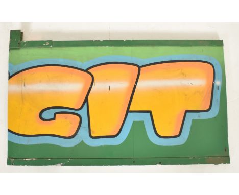 A vintage funfair / amusement park / fairground wooden board sign reading 'GIT'. The sign on green ground with yellow bubble 