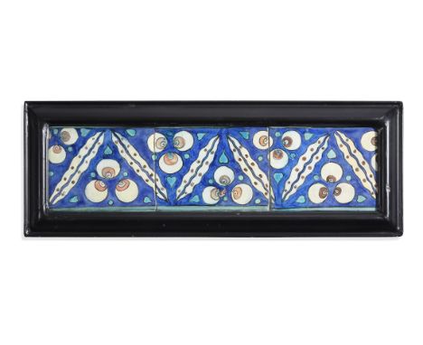 THREE DIYARBEKIR POTTERY TILES EAST ANATOLIA, LATE 16TH CENTURY Within a later ebonised frame 15.2cm x 55.2cmProvenance: Chri