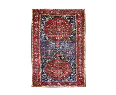 A USHAK 'MEDALLION' CARPET WESTERN ANATOLIA CIRCA 1600  Approximately 563cm x 381cm   This grand Ottoman carpet comes from a 