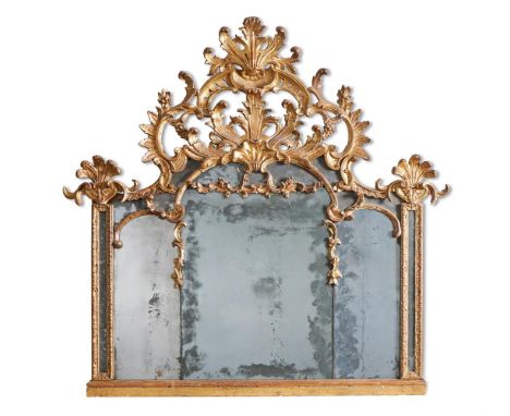 A CARVED GILTWOOD OVERMANTEL MIRROR NORTH ITALIAN, SECOND QUARTER 18TH CENTURY  The crest with feathers, scrolls, leaves, flo