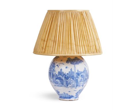 A BLUE AND WHITE FAIENCE OVOID JAR IN TRANSITIONAL STYLE DUTCH OR NORTH GERMAN, CIRCA 1700 AND LATER CONVERTED TO LAMP With a