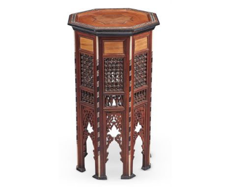 Y&nbspA WALNUT, MOTHER OF PEARL AND BONE INLAID OCTAGONAL TABLE  SYRIAN, MID 20TH CENTURY  The recessed top centred with a st