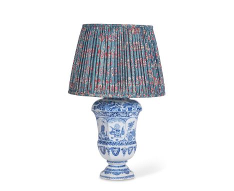 A DELFT BLUE AND WHITE TRANSITIONAL VASE LAMP  CIRCA 1700 AND LATER FITTED AS A LAMP  Of octagonal section, with an Indian ha