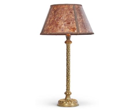 AN ARTS AND CRAFTS BRASS CANDLESTICK IN THE MANNER OF HART, SON, PEARD & CO., 19TH CENTURY  Now fitted as a table lamp with p