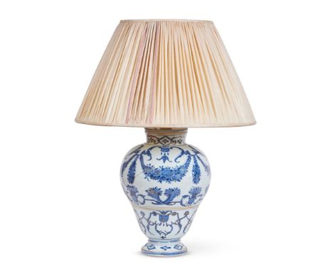 A BLUE AND WHITE PORCELAIN LAMP  JAPANESE, LATE 17TH CENTURY AND LATER FITTED AS A LAMP  With stripe woven raw silk shade vas
