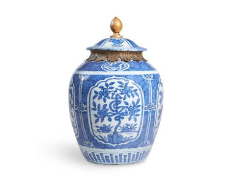 A BLUE AND WHITE LARGE VASE AND COVER CHINESE, 17TH CENTURY Painted with a shou characters as the trunk four various trees 45