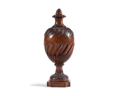 AN EARLY GEORGE III CARVED URN FINIAL  ATTRIBUTED TO JAMES GIBBS, CIRCA 1760-1780 Possibly the finial to a bookcase, carved a