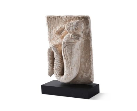 AN EGYPTIAN LIMESTONE SACRED COBRA IN HIGH RELIEF  ROMAN, CIRCA 1ST-3RD CENTURY A.D.  Carved with details of scales on the bo