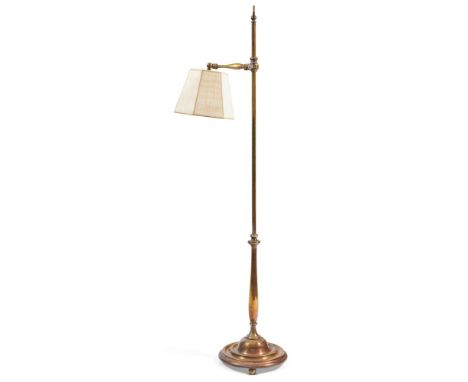 AN EDWARDIAN ADJUSTABLE BRASS READING LAMP  CIRCA 1900-1910  Formerly silvered, later fitted for electricity and with hexagon