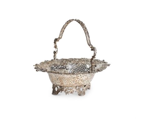 A GEORGE II SILVER SHAPED OVAL SWING HANDLED CAKE-BASKET GEORGE METHUEN, LONDON 1753 With a pierced, floral and foliate swing