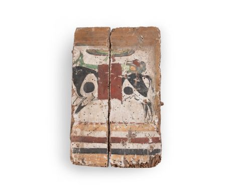 AN EGYPTIAN POLYCHROME PAINTED COFFIN FOOT PANEL  LATE PERIOD, AFTER 664 B.C.  With a running Apis bull carrying the deceased
