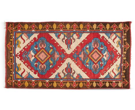 A KARAPINAR RUG  ANATOLIA, MODERN  Approximately 221cm x 121cm          Condition Report:  Overall the condition of this rug 