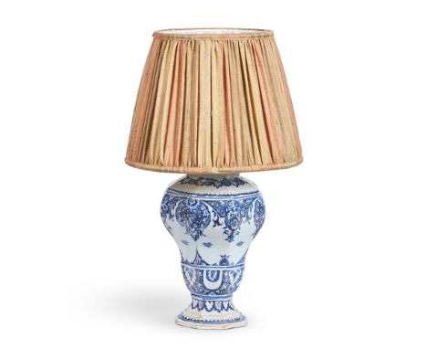 A ROUEN FAIENCE BLUE AND WHITE OCTAGONAL SECTION BALUSTER VASE  18TH CENTURY AND LATER FITTED AS A LAMP  Typically decorated 