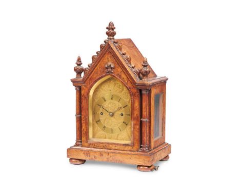 AN EARLY VICTORIAN CARVED AND BURR OAK SMALL MANTEL CLOCK  VINER, LONDON, CIRCA 1841  The twin fusee gong-striking movement w