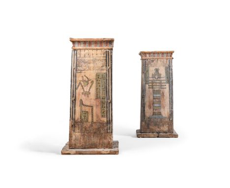 TWO EGYPTIAN POLYCHROME GESSO PAINTED WOOD CANOPIC BOXES  PTOLEMAIC PERIOD, 304-30 B.C.  Each formed of several pieces of woo