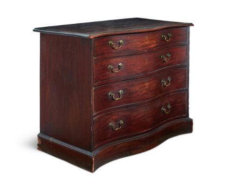 A GEORGE III MAHOGANY SERPENTINE COMMODE OR DRESSING CHEST  CIRCA 1780  Unusually with a plinth base  86.5cm high, 111cm wide