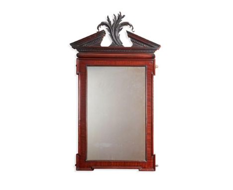 A GEORGE II MAHOGANY MIRROR CIRCA 1740  The architectural dentil carved pediment centred with carved leaves, the crossbanded 