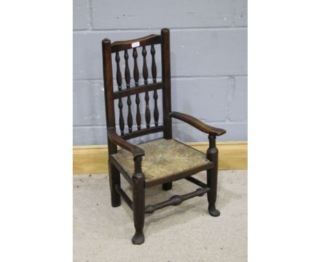 19th Century stick back child's chair, with turned sticks and a rush seat&nbsp;