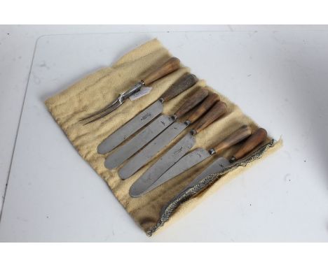 Set of six horn handled and Sheffield steel bladed knives, and a carving fork similar (7)