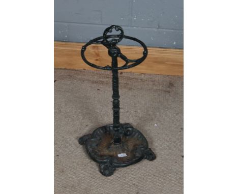 Cast iron stick stand, with two divisions and loop carrying handle, 56 cm tall approx.