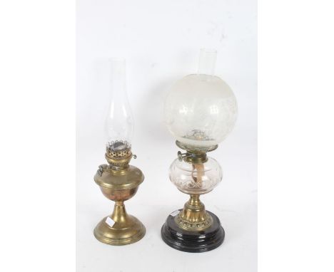 Two oil lamps, Duplex with a clear glass chimney and a frosted shade and a clear reservoir together with Best English Make oi