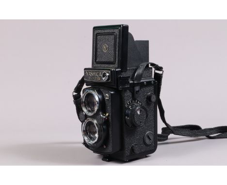 A Yashica Mat-124 G TLR Camera, serial no 124622, body VG, dust to mirror and screen, Copal-SV shutter working, meter reacts 