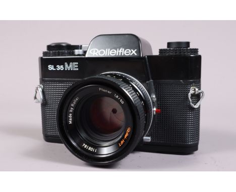 A Rolleiflex SL35 ME SLR Camera, made in Singapore, serial no 4938580, shutter working, meter responsive, body G-VG, missing 