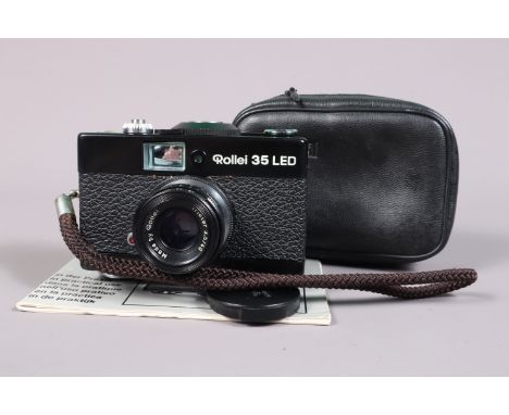 A Rollei 35 LED Compact Camera,  black, made in Sigapore, serial no 7394741, shutter working, meter untested, body G, some li