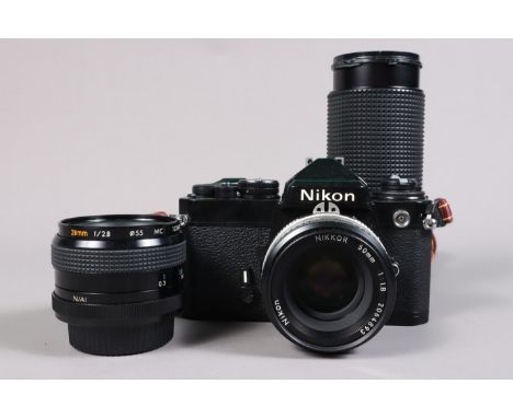 A Nikon FE Camera Outfit,  black, serial no 3570667, shutter working, meter responsive, self timer working, body G-VG, with N