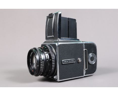 A Hasselblad 500C/M Camera, chrome, serial no RT 1314062, shutter working, body VG, with Carl Zeiss T* 80mm f/2.8 lens, seria