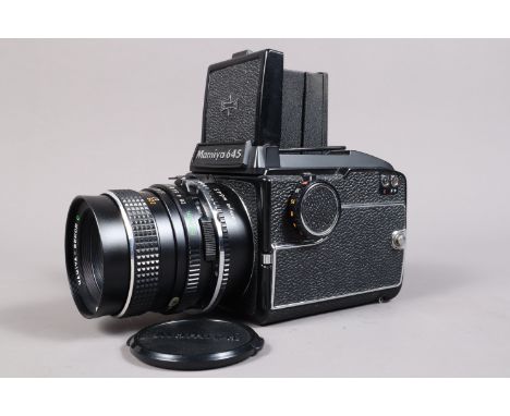 A Mamiya M645 Camera, serial no L 163804, shutter working, body G-VG, with Mamiya-Sekor C 80mm f/2.8 lens, serial no 105508, 