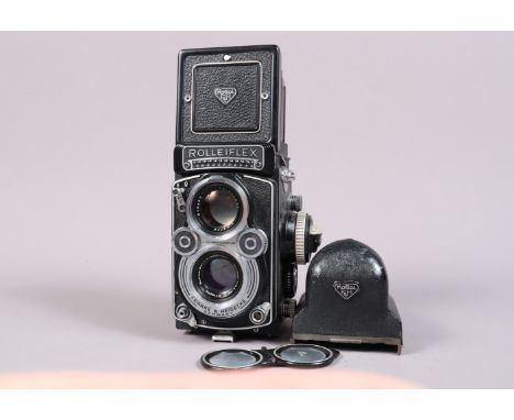 A Rolleiflex 3.5F TLR Camera, serial no 2217099,  shutter working, meter responsive, body G, light wear, with Schneider Kreuz