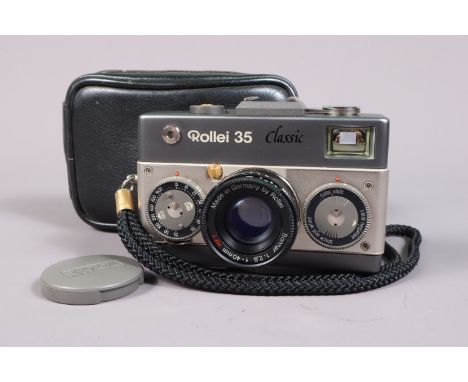 A Rollei 35 Classic Titanium Compact Camera, made in Germany, serial no 8101240, shutter working, meter responsive, with Roll