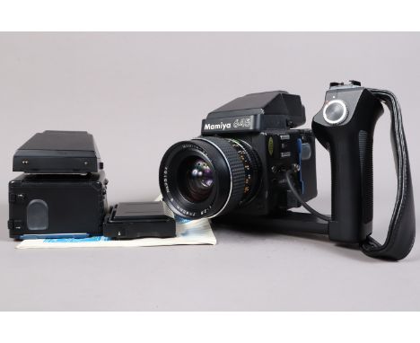 A Mamiya 645 Super Camera, serial no 209334, shutter working, body G, light wear, with waist level finder, 645 prism finder, 