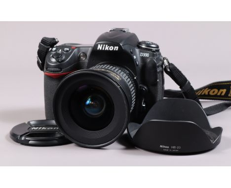 A Nikon D300 DSLR Camera, serial no 6022978, body G, rubbing to base, powers up, takes a picture, shutter working, meter resp