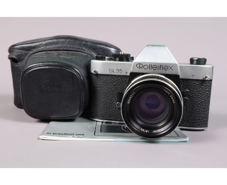 A Rolleiflex SL35 SLR Camera,  chrome, made in Germany, shutter working, meter responsive, self timer working, body G-VG, wit